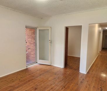 CONVENIENTLY LOCATED TWO BEDROOM UNIT - Photo 6