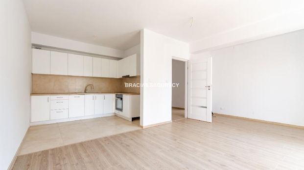 Mieszkanie małopolskie Skawina powierzchnia 74.48 m² C206-WM-92624 - Фото 1