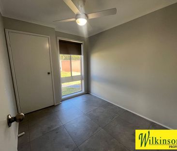 Better than New - 3 bedroom home on large block with garage - Photo 5