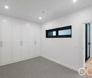 Open the Door to Elevated East-Facing Living with Sweeping Views - Photo 3