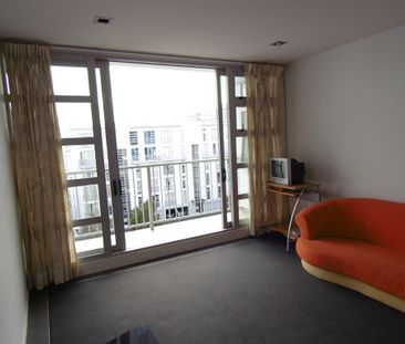 Convenient city living - one carpark included - Photo 1