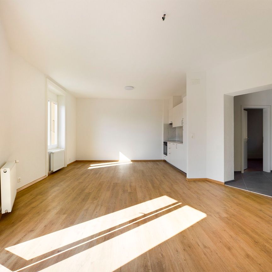 CENTRAL 3.5-ROOM APARTMENT ON THE 2ND FLOOR WITH BALCONY - Photo 1