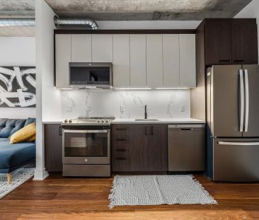 150 Marketplace — 1 Bedroom + Den - Photo 1