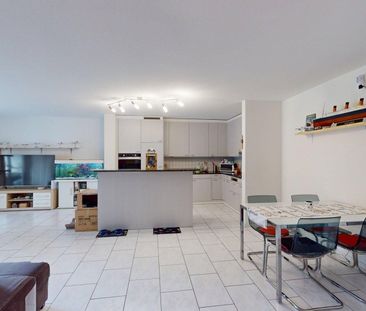 Modern, large 3.5-room apartment with garden seating area - Photo 1