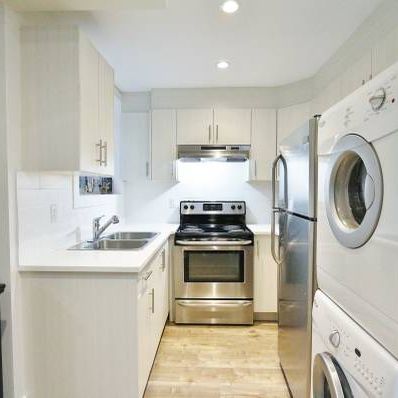 MODERN and very spacious 2 bedroom suite - utilities included! - Photo 4