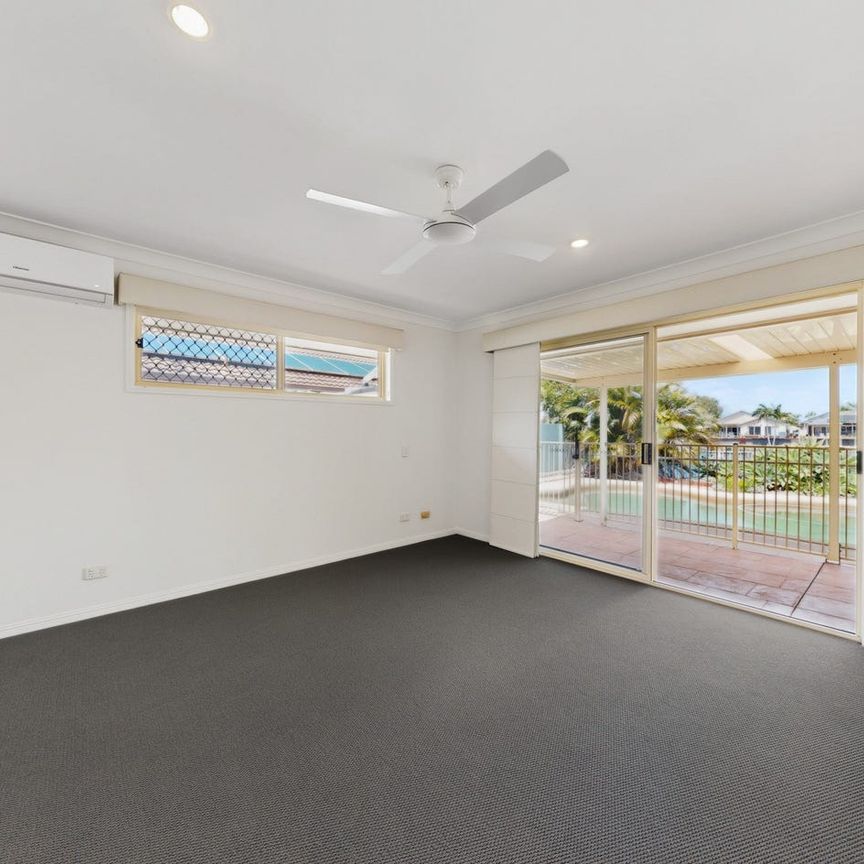 Freshly Refreshed Waterfront Family Home in a Convenient Helensvale Location - Photo 1