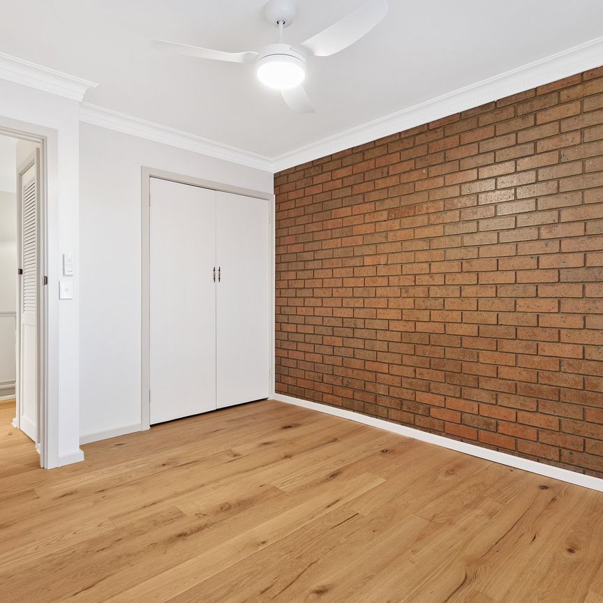 Renovated 2-Bedroom Townhouse in Prime Coburg Location - Photo 1