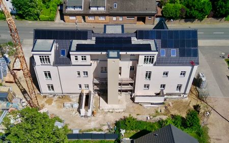 Ein architektonisches Highlight: Wohnen im historischen Schulgebäude mit modernster Technik! - Foto 4