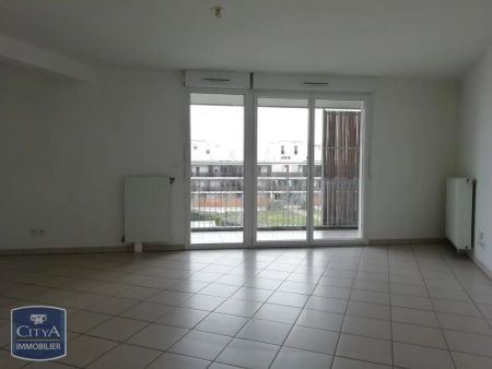 Appartement à louer 4 pièces 80m² - Photo 2