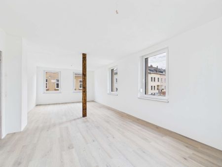 Erstbezug: charmante 3-Zimmer-Wohnung mit Garten in Auerbach - Photo 2