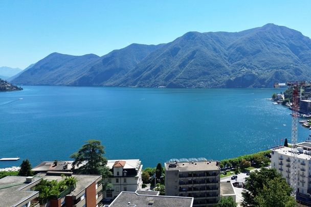EXCLUSIVE PENTHOUSE WITH LAKE VIEW - Photo 1