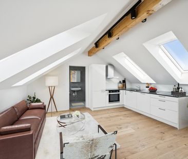 Erstbezug nach komplettem Dachausbau exklusive Dachgeschosswohnung... - Foto 1
