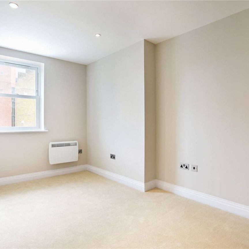 A luxury one bedroom apartment with off street parking. - Photo 1