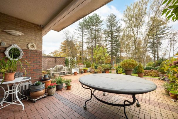 Gelijkvloers drie-slaapkamer appartement met zicht op de Golf van Brasschaat - Photo 1