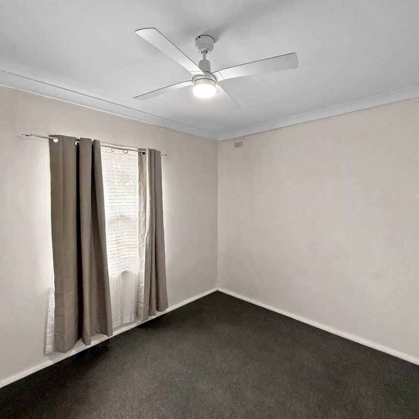 Affordable 3 Bedroom Duplex with Low Maintenance Yards - Photo 1