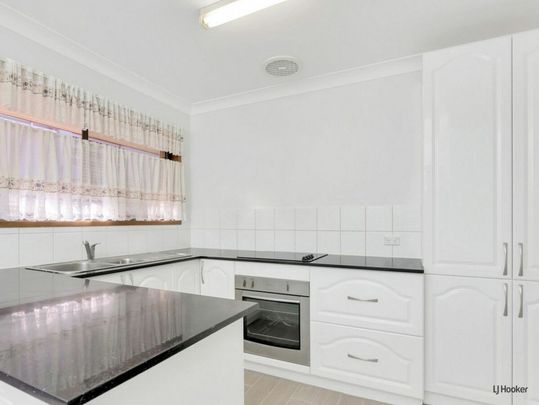 Renovated Three-Bedroom Duplex in a Convenient Gold Coast Location - Photo 1