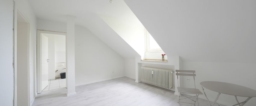Gemütliche, grundsanierte Dachgeschosswohnung (2. OG) in begehrter Lage von Bockum - Photo 1