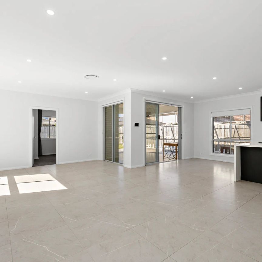 Modern Luxury with Multiple Living Zones & Low-Maintenance Backyard - Photo 1