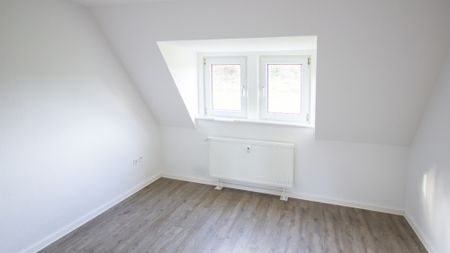 Charmante Dachgeschosswohnung! - Foto 4