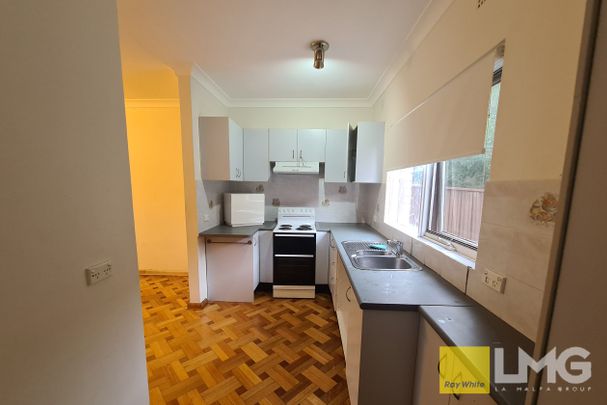 3 BEDROOM TOWNHOUSE WITH GARAGE - Photo 1