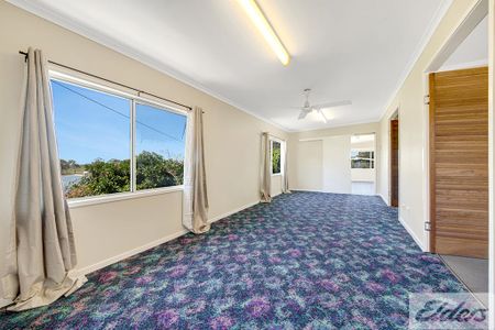 THIS 3 BEDROOM HOME WITH A RUMPUS ROOM OFFERS COMFORT AND SPACIOUS LIVING! - Photo 4