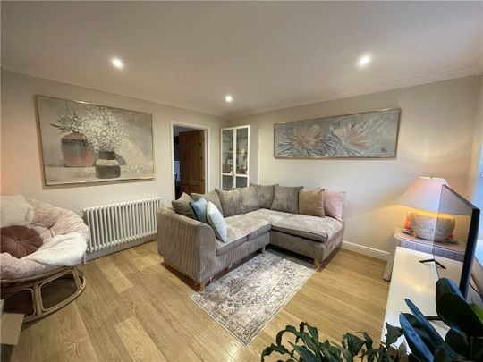 A beautifully presented unfurnished two bedroom terraced house on the outskirts of Marlborough with stunning views of the surrounding North Wessex Downs. - Photo 1