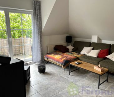 Wohnen in einer gemütlichen Dachgeschosswohnung in zentraler Lage d... - Foto 1