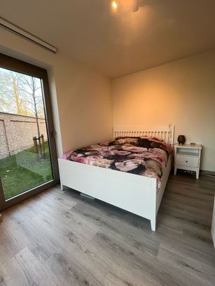 Gelijkvloers appartement met 2 slaapkamers en tuin - Foto 1