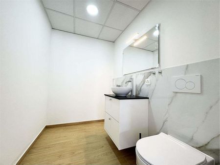 3.5 room apartment in the center of Lugano with partial lake view - Photo 2