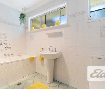 Comfortable 3 Bedroom Home with Private Entertaining Deck - Photo 1