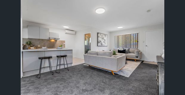 Spacious Renovated Home with Multiple Living Areas + Kitchenette - Photo 1