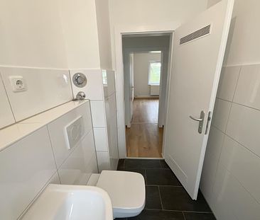 Renovierte 3-Zimmer-Wohnung mit Balkon und neuem Duschbad! - Foto 1