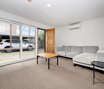 Three Bedroom at Rear of Quiet Complex, Close to Amenities - Photo 1