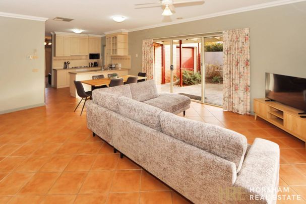 Fully Furnished 3-Bedroom Home with Modern Comforts & Outdoor Entertaining - Photo 1