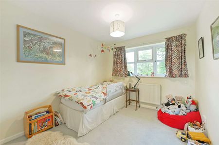 A spacious four-bedroom detached family home with mature gardens, double garage and versatile living space in the village setting of West Heath. - Photo 5
