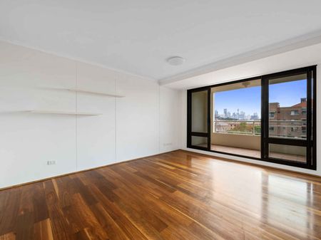 NEWLY UPDATED NORTH FACING SPLIT LEVEL TWO BEDROOM APARTMENT WITH CITY VIEWS - Photo 5