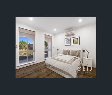 FAMILY OASIS WITH TRIPLE GARAGE & POOL! - Photo 4