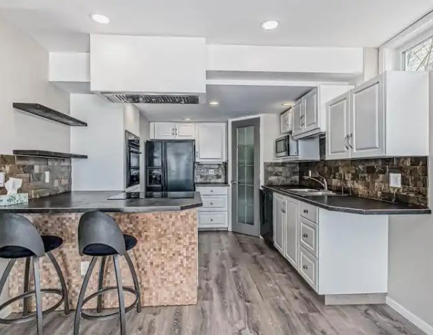 Bright Walkout Suite 1B/1B in Coventry Hills | Calgary - Photo 1