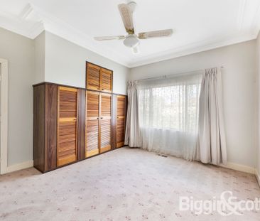 Character filled residence with original features set in a sought a... - Photo 3