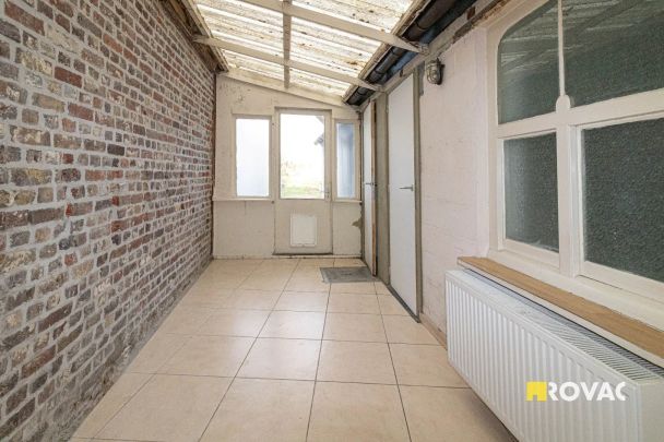 Verzorgde rijwoning met grote tuin! - Photo 1