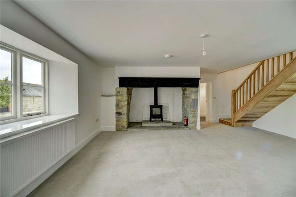 A very well presented and newly refurbished four bedroom farmhouse with solar panels situated in a rural position and accessed by a private driveway. - Photo 1