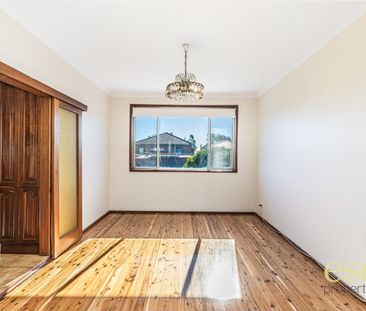 Charming Four-Bedroom Home with Garage and Convenient Location - Photo 2