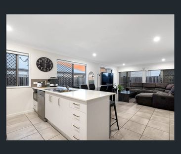 New Home Bliss: 4 Bed, 2 Bath Rental with Open Living & Landscaped ... - Photo 1