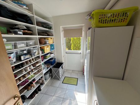 Luxueus gelijkvloers appartement met 3 slaapkamers, tuin en garage - Photo 3