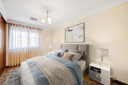 Stylish 4-Bedroom Home with Huge Garage and Family-Friendly Backyard - Photo 3