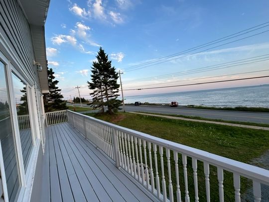 CHARMING 3-BED, 1-BATH SEASIDE FLAT | 1754 SHORE ROAD, EASTERN PASSAGE | $2,595 INCLUDES OIL AND WATER AVAILABLE NOV 1 – OCEAN VIEWS, STEPS TO FISHERMAN’S COVE & BEACHES - Photo 1