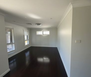 Perfectly Positioned Family Home - Walk to Shops, Schools & Parks - Photo 1
