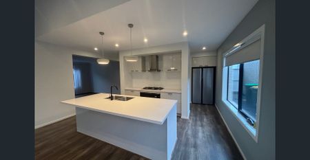 LUSH EX-DISPLAY HOME, 2 LIVING, CENTRAL COOLING - Photo 3