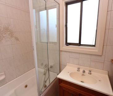 Three Bedroom Home with Large Yard! - Photo 6