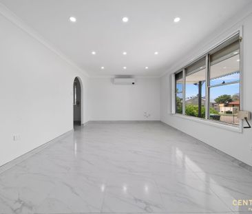 Prime Location! Renovated Family Home! - Photo 6